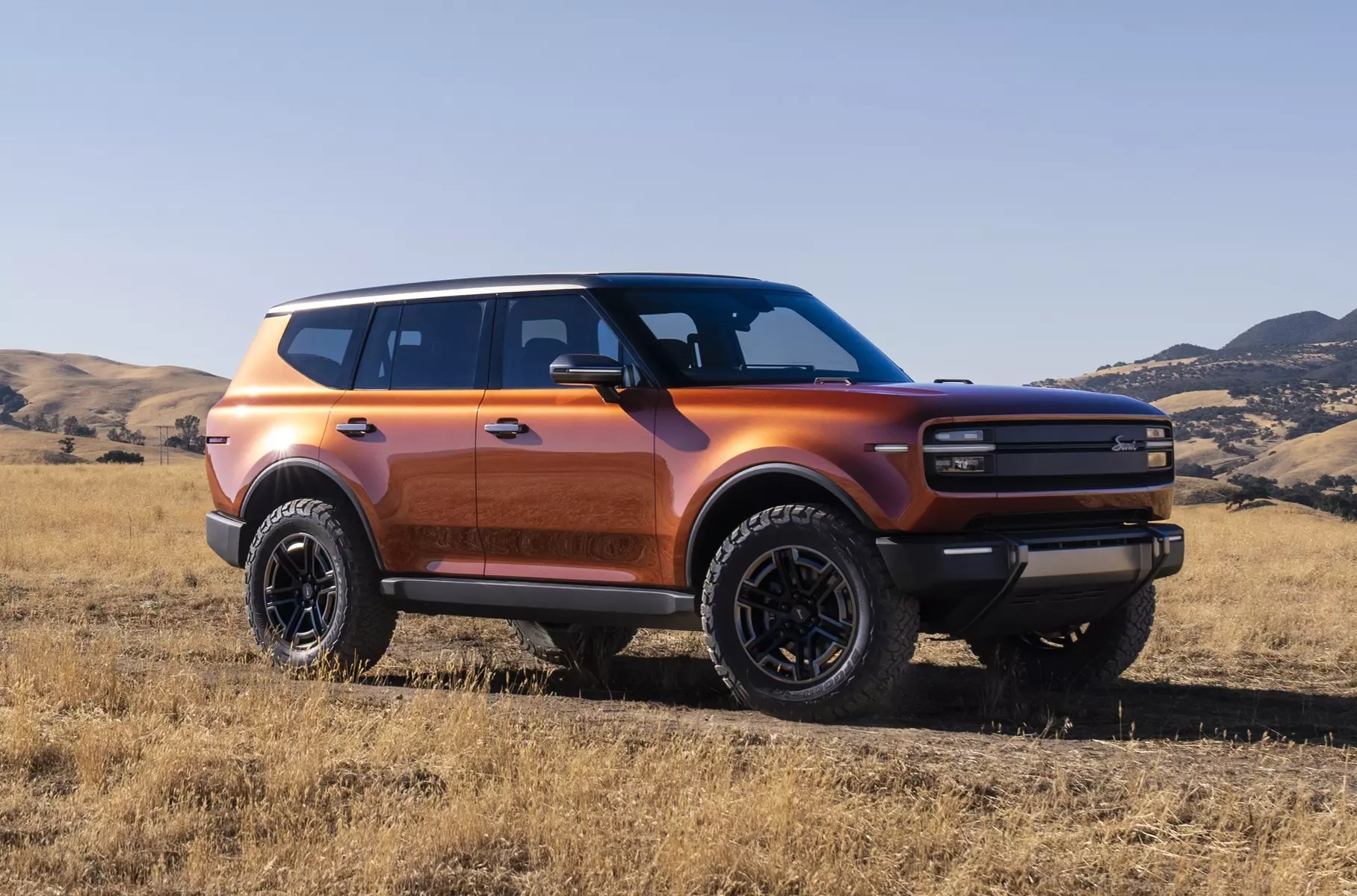 A queue lined up for electric cars of the revived Scout brand