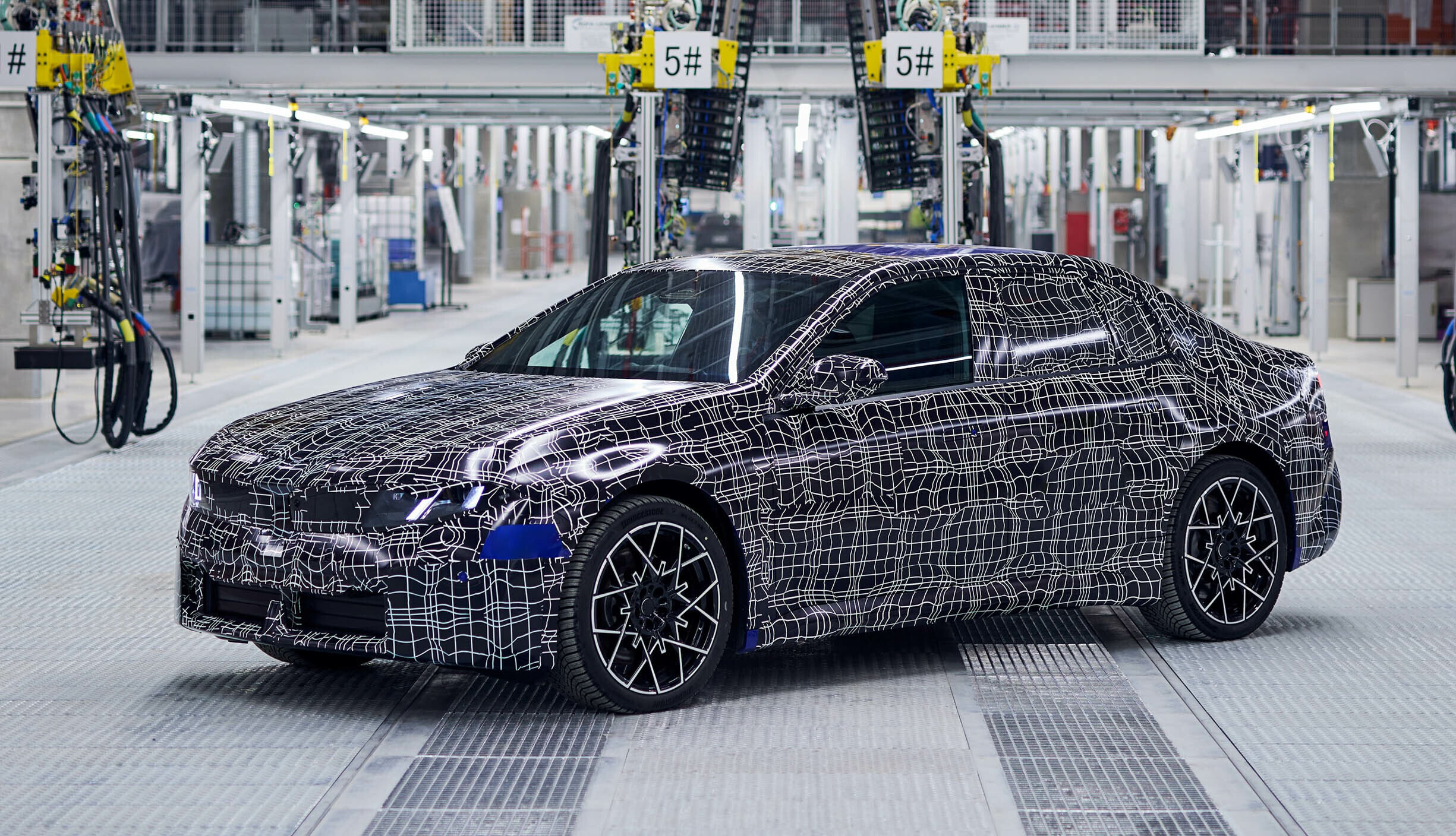 BMW has begun assembling the new i3 electric car at the Munich plant.