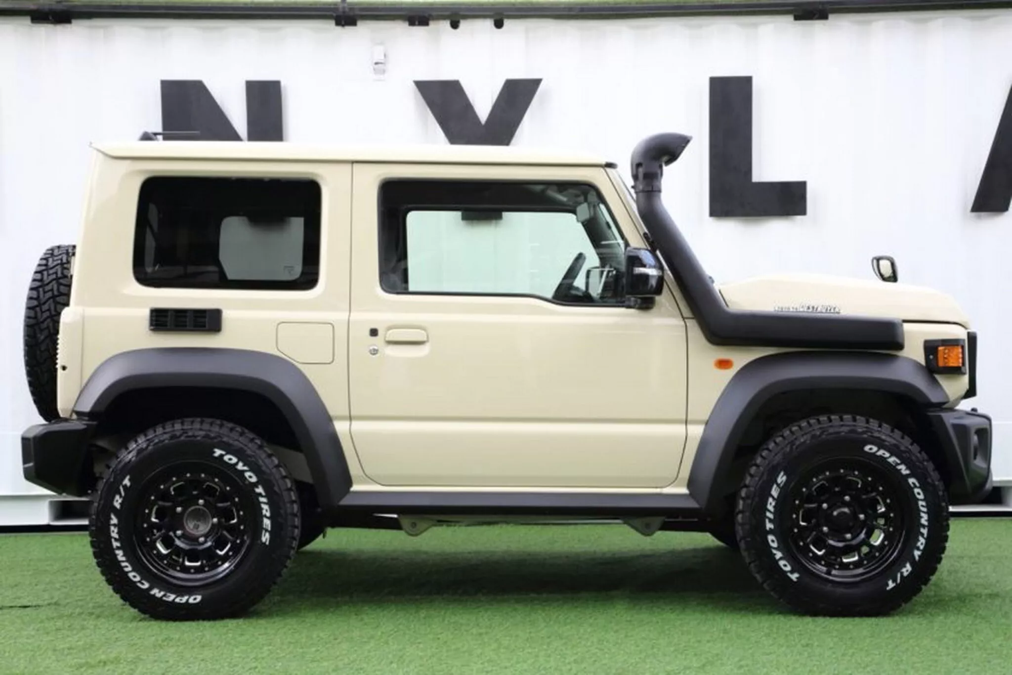 Suzuki Jimny turned into a miniature Toyota Land Cruiser using a styling package