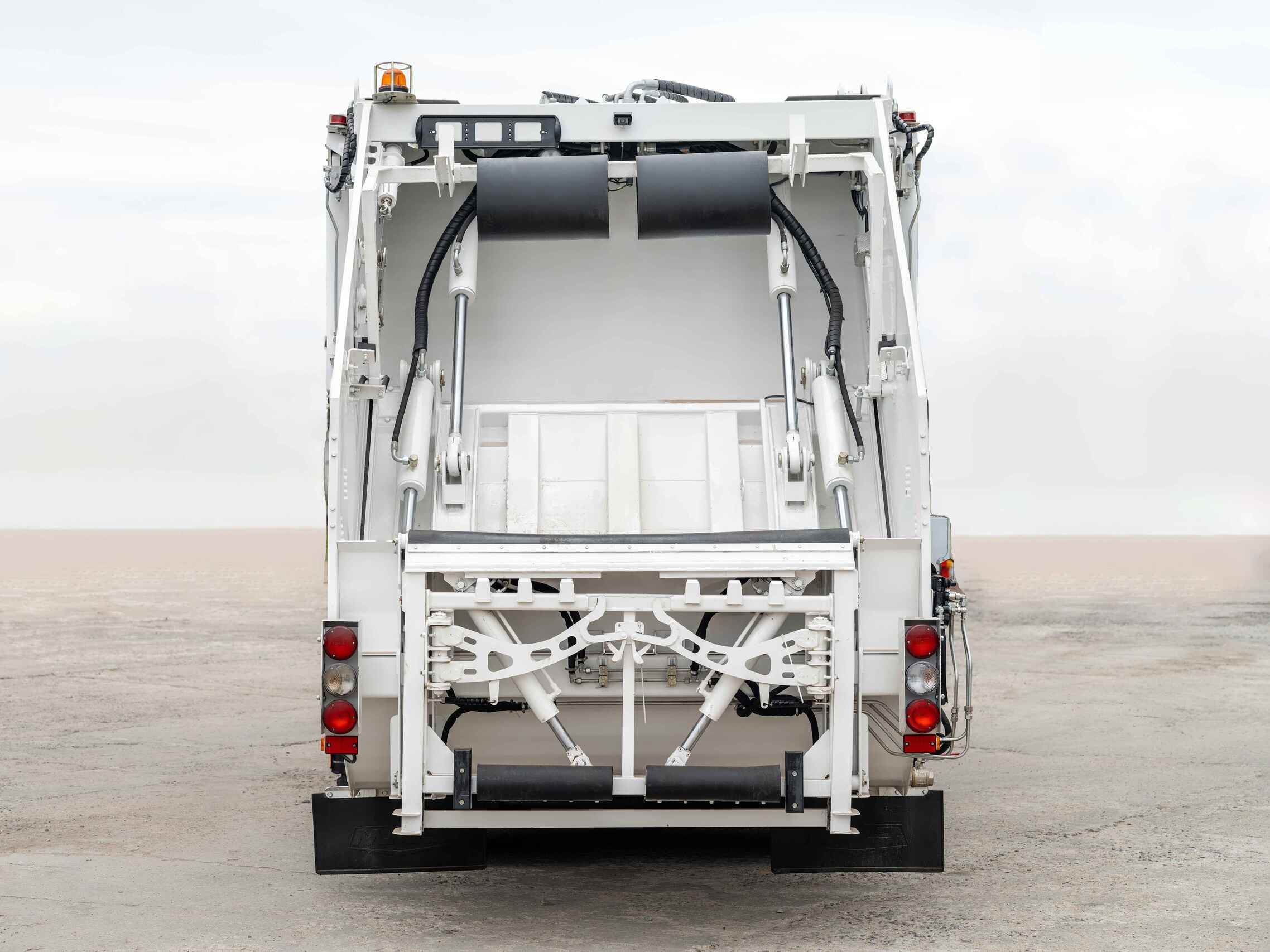 MAZ has created a garbage truck equipped with three pairs of steered wheels