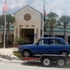 In Miami, a service station owner lures customers with Zhiguli cars from the USSR